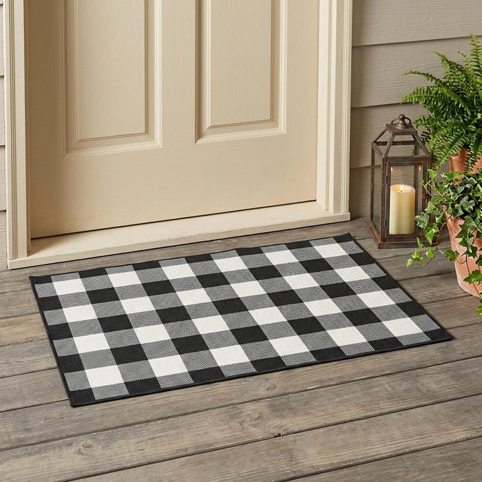 2' X 4' Black And Ivory Indoor Outdoor Area Rug