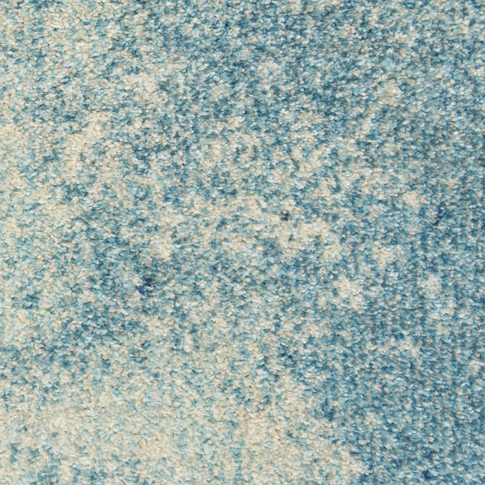 4' X 6' Blue And Ivory Abstract Area Rug