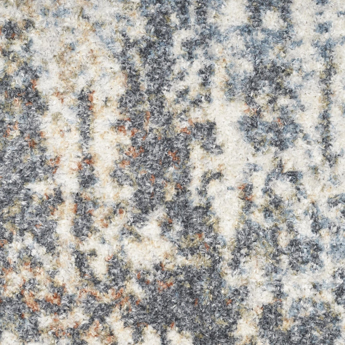 4' X 6' Blue and Ivory Abstract Power Loom Washable Area Rug