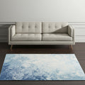 5' X 7' Blue And Ivory Abstract Area Rug