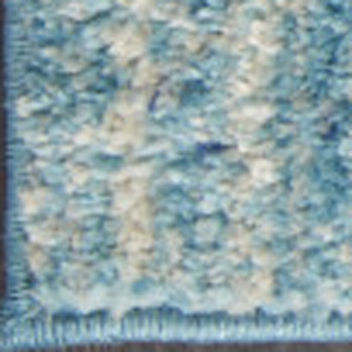 5' X 7' Blue And Ivory Abstract Area Rug