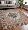 5' X 7' Blue Orange And Black Jute Medallion Hand Woven Area Rug