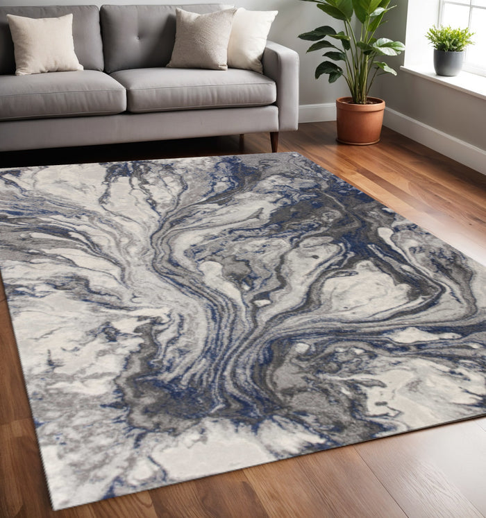 5' X 8' Blue And Gray Abstract Area Rug