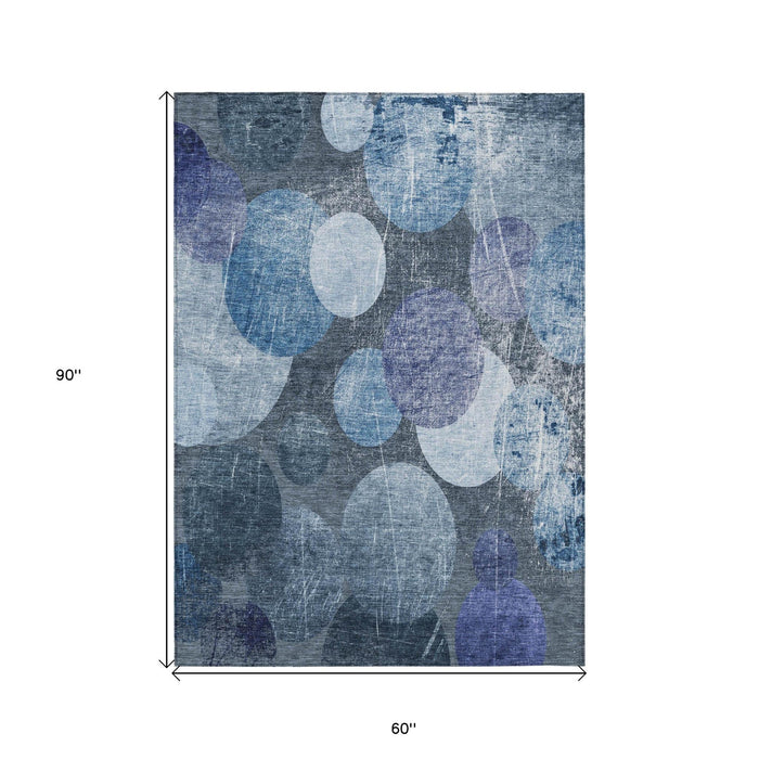 5' X 8' Gray and Blue Abstract Washable Non Skid Indoor Outdoor Area Rug