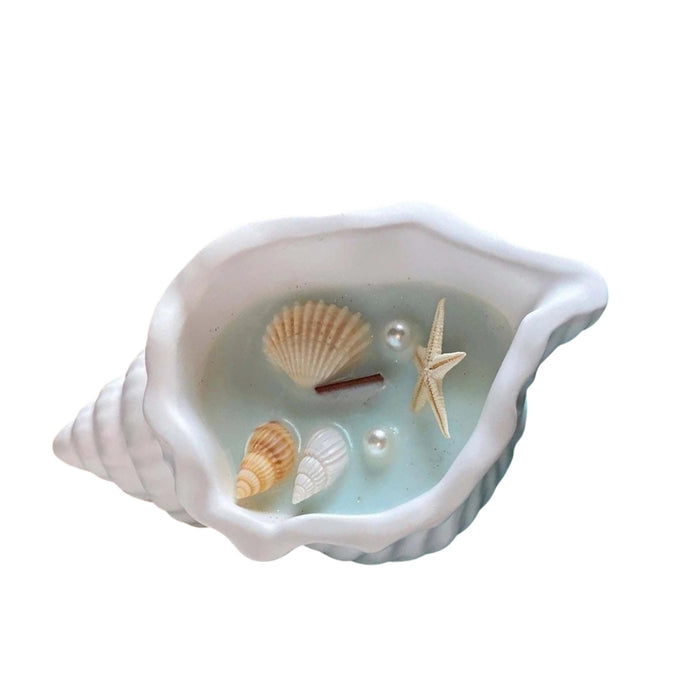 6" Light Blue Ocean Breeze Scented Candle In White Resin Novelty Holder With Shells