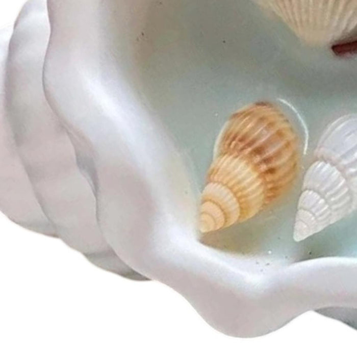 6" Light Blue Ocean Breeze Scented Candle In White Resin Novelty Holder With Shells