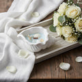 6" Light Blue Sea Salt And Orchid Scented Candle In White Resin Novelty Holder With Shells