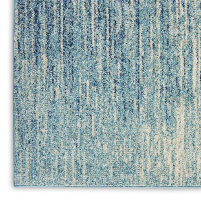 8' X 10' Blue And Ivory Abstract Area Rug