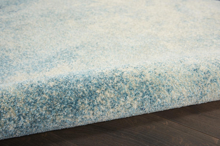 8' X 10' Blue And Ivory Abstract Area Rug
