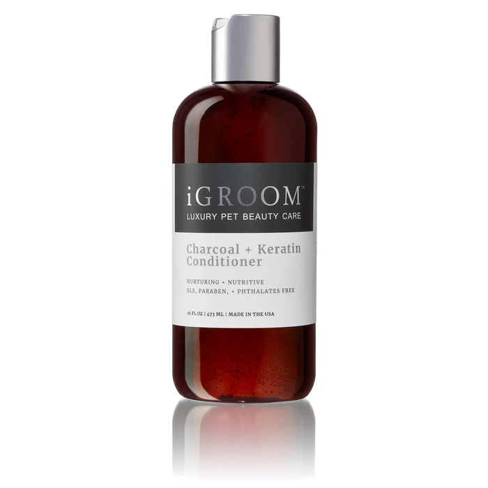 Dark bottle of iGroom Charcoal and Keratin Conditioner with a silver cap