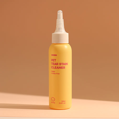 Yellow squeeze bottle of INOOM vegan Pet Tear Stain Cleaner