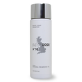 White bottle of Isle of Dogs No.16 White Coat Shampoo with a silver cap