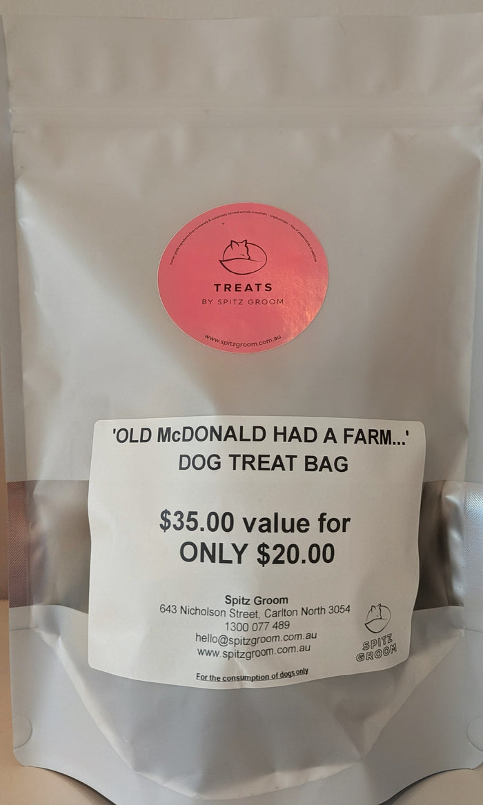 Front of the Spitz Groom 'Old McDonald Had a Farm' dog treat bag with pink Treats sticker and pricing label