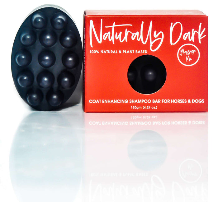 Black massage-textured shampoo bar beside red Naturally Dark Coat Enhancing Shampoo Bar box