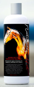 Bottle of Natural Hot Oil Intensive Coat Treatment with fiery horse image on black label