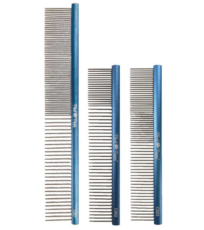 Three Plush Puppy Professional Grooming Combs in different lengths lined up together