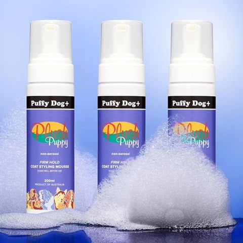 Three cans of Plush Puppy Puffy Dog+ Firm Hold Coat Styling Mousse with foam