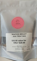Silver Seafood Medley dog treat bag with Spitz Groom Treats sticker and price label