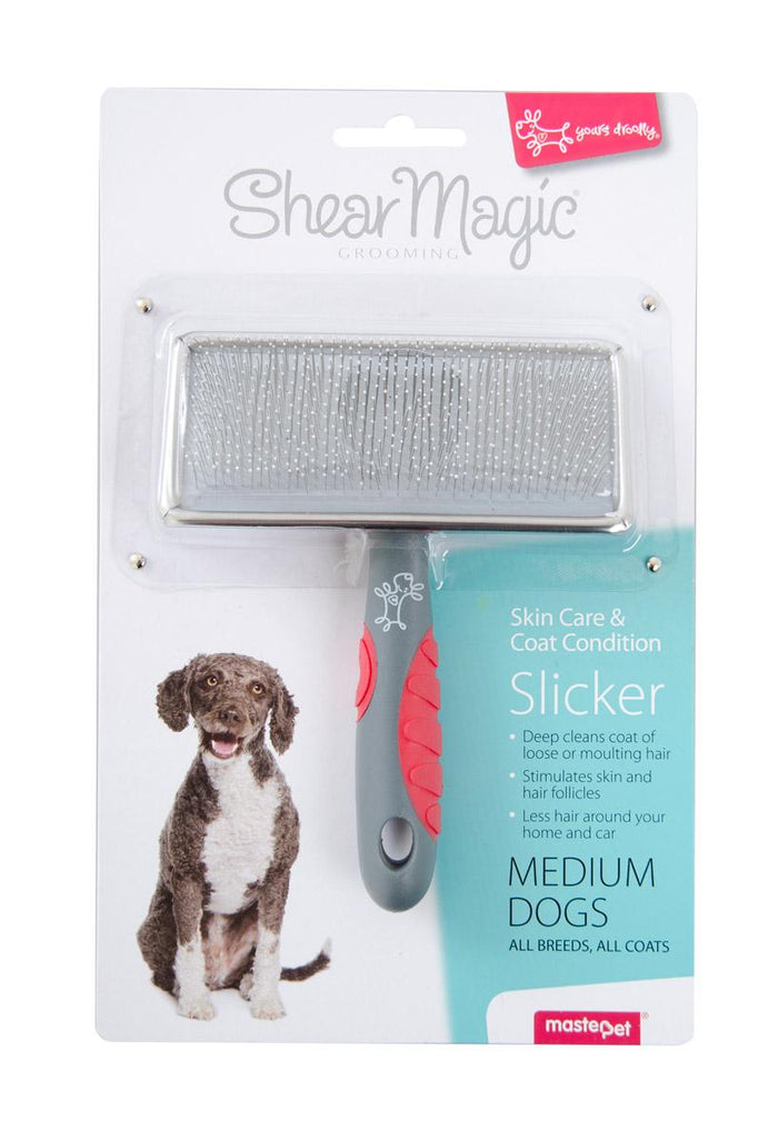 Shear Magic soft slicker brush for medium dogs on its retail packaging with a poodle mix pictured