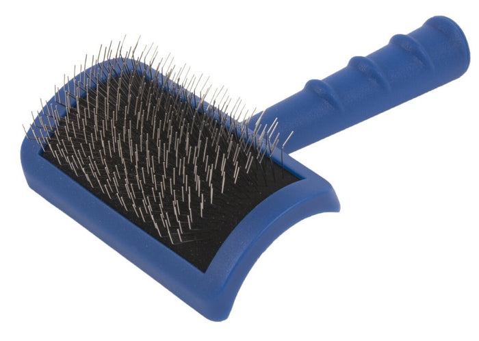 Blue Show Tech firm slicker brush with long metal pins and ergonomic handle, angled view