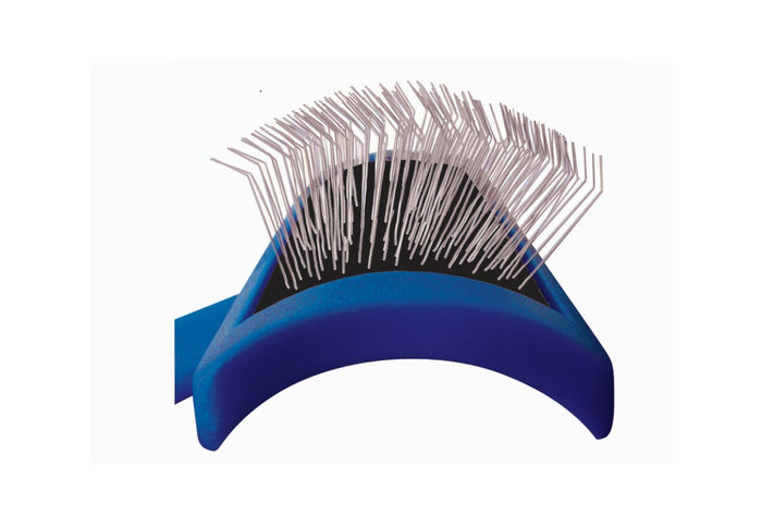 Close-up of the Show Tech firm slicker brush's long bent metal pins