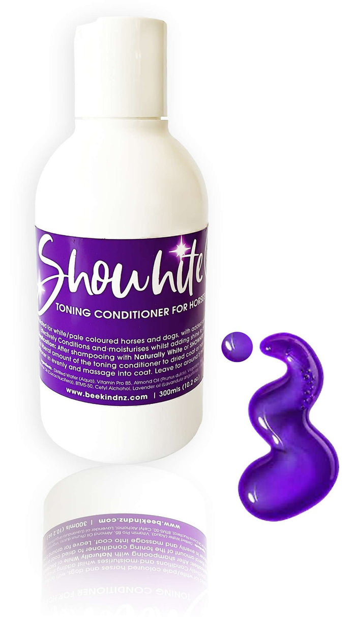 Bottle of Showhite Toning Creme Conditioner for horses beside a dollop of purple conditioner