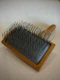 Close-up of the wire pins on the Spitz Groom Extra Firm Medium Dog Slicker Brush