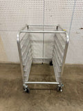 Used Don 1141733 7 Slot Sheet Pan Rack on Casters - WO1 - Falcon Restaurant Supply - 1