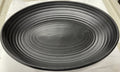 Used Tuxton TuxTrendz Zion Matte Black 35 oz. Embossed Oval China Bowl - WO1 - Falcon Restaurant Supply - 1