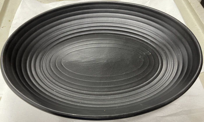 Used Tuxton TuxTrendz Zion Matte Black 35 oz. Embossed Oval China Bowl - WO1 - Falcon Restaurant Supply - 1